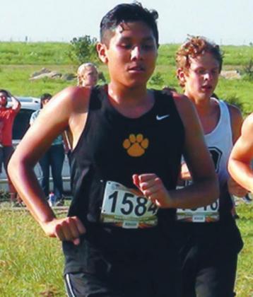 David Mendez runs in the Cat Run on September 5.The Madill boys won first place. Courtesty photo