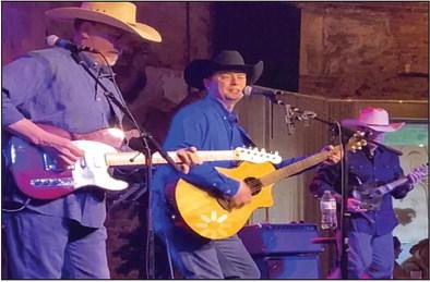 Mitch Rhodes, singer of the King George cover band, happened across a Facebook ad for the gig of singing George Strait songs. Staci Stewart