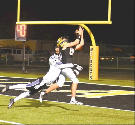 Dibbon Marris • For The Madill Record Madill freshman tight end RIver Shaw makes a touchdown catch in the fourth quarter of the Wildcats’ 56-28 loss to the Bethany Bronchos on Nov. 1. The Wildcats head to Tecumseh on Friday, Nov. 8 for their final game of the season.