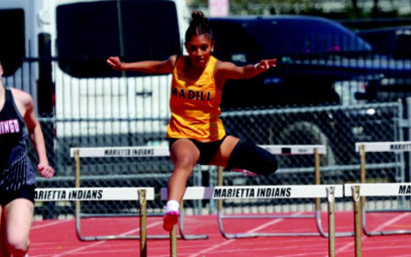 Uriana Rivera runs the hurdles. Courtesy photo