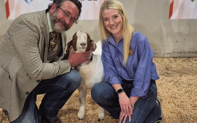 Pictured left: Josh Cantrell shows Zoey Goff's goat. Pictured right: Cantrell and Goff with her goat. Courtesy photos