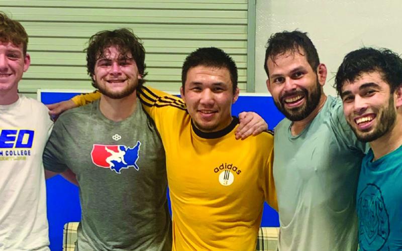 Nurkozha Kaipanov, center, standing with Marshall Mansfield, Chase Saba, Peter Hammer and Mirzo Khayitov (left to right). Courtesy photo