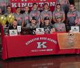 Dakota Sliger (center, camo shirt) poses with his shooting team at his college signing on March 5. Crystal Burnezky-Robertson • The Madill Record