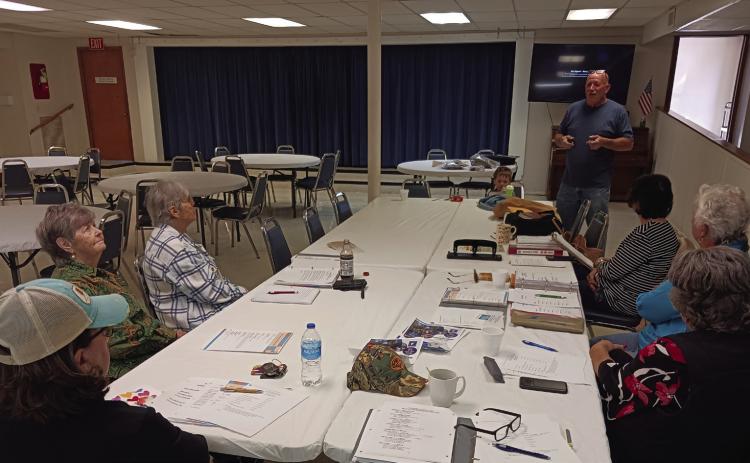 Pat Tickel teaches the Madill Rose Garden Club all about bees. Courtesy photo